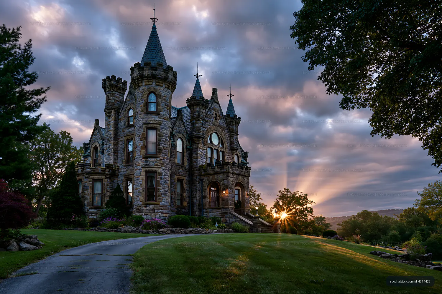 Historic stone castle at sunset with cloudy sky