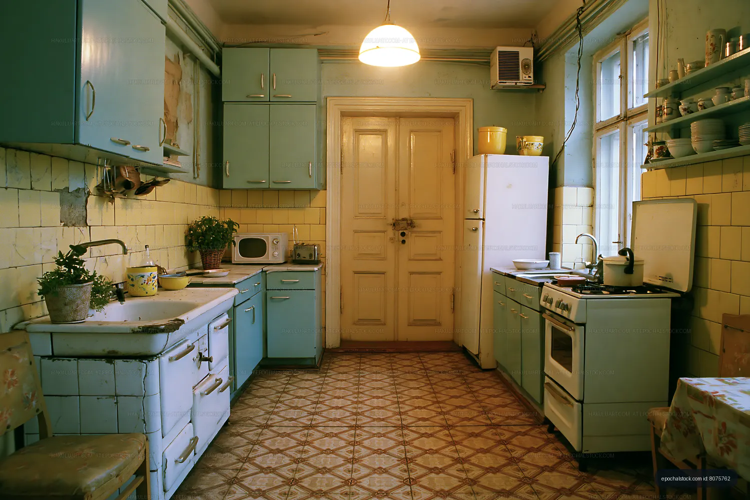 Vintage kitchen with blue cabinets and old appliances in a home