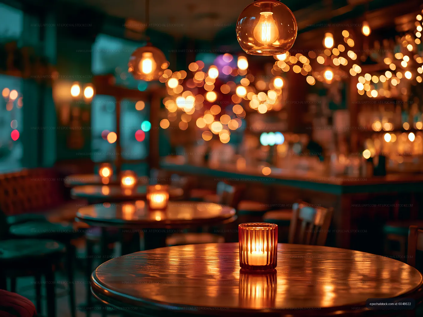 Warm lighting in a cozy restaurant with glowing candles