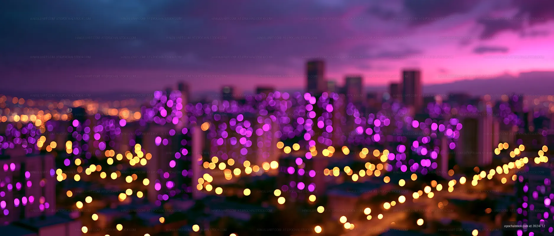 City skyline at night with colorful lights in the background