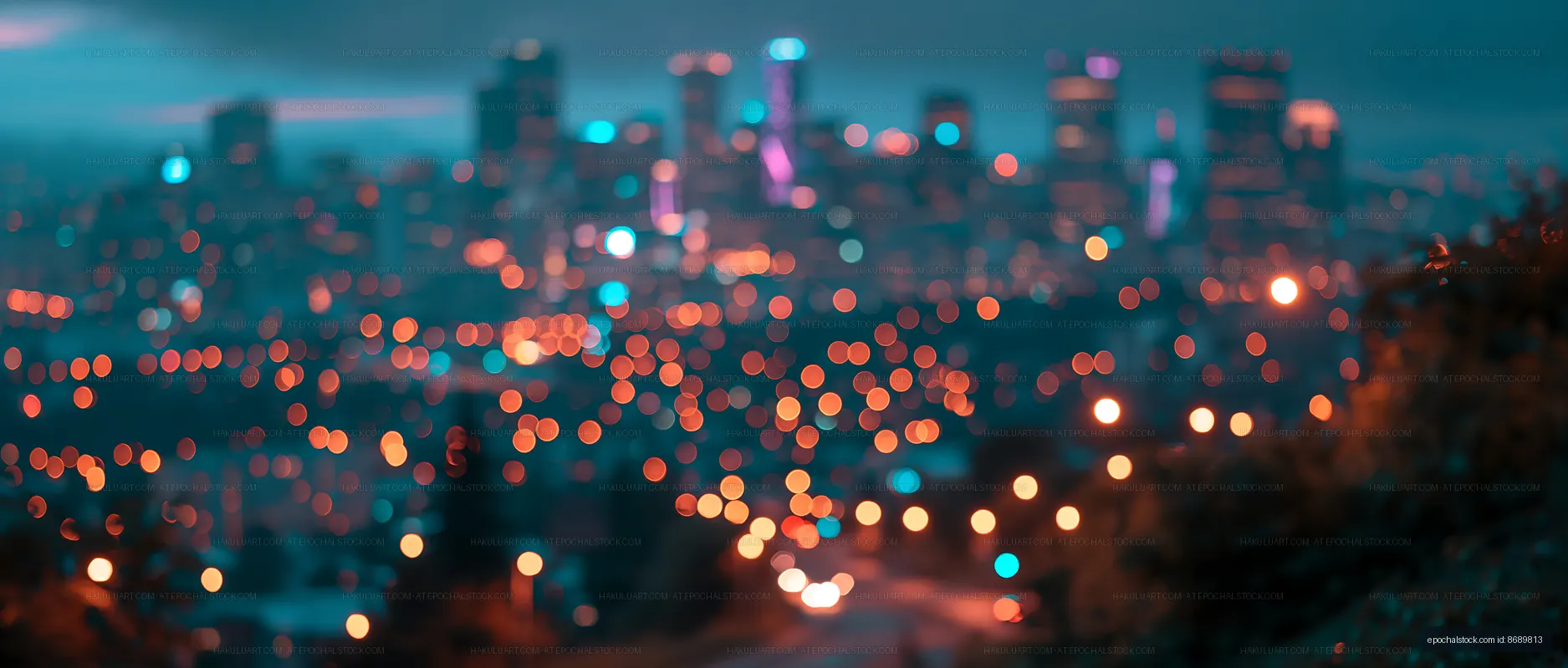 City skyline at night with blurred lights