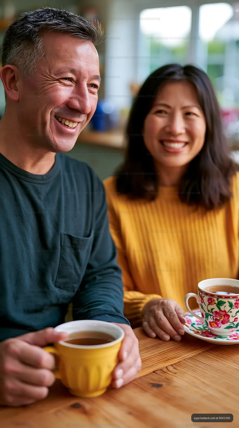 Couple enjoys coffee together in a cozy setting
