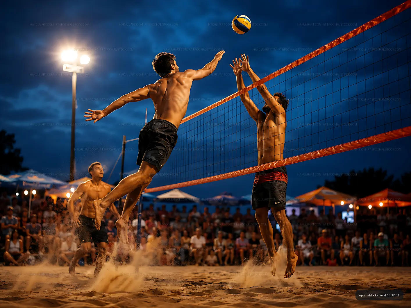 Beach volleyball match at dusk with players jumping to hit ball
