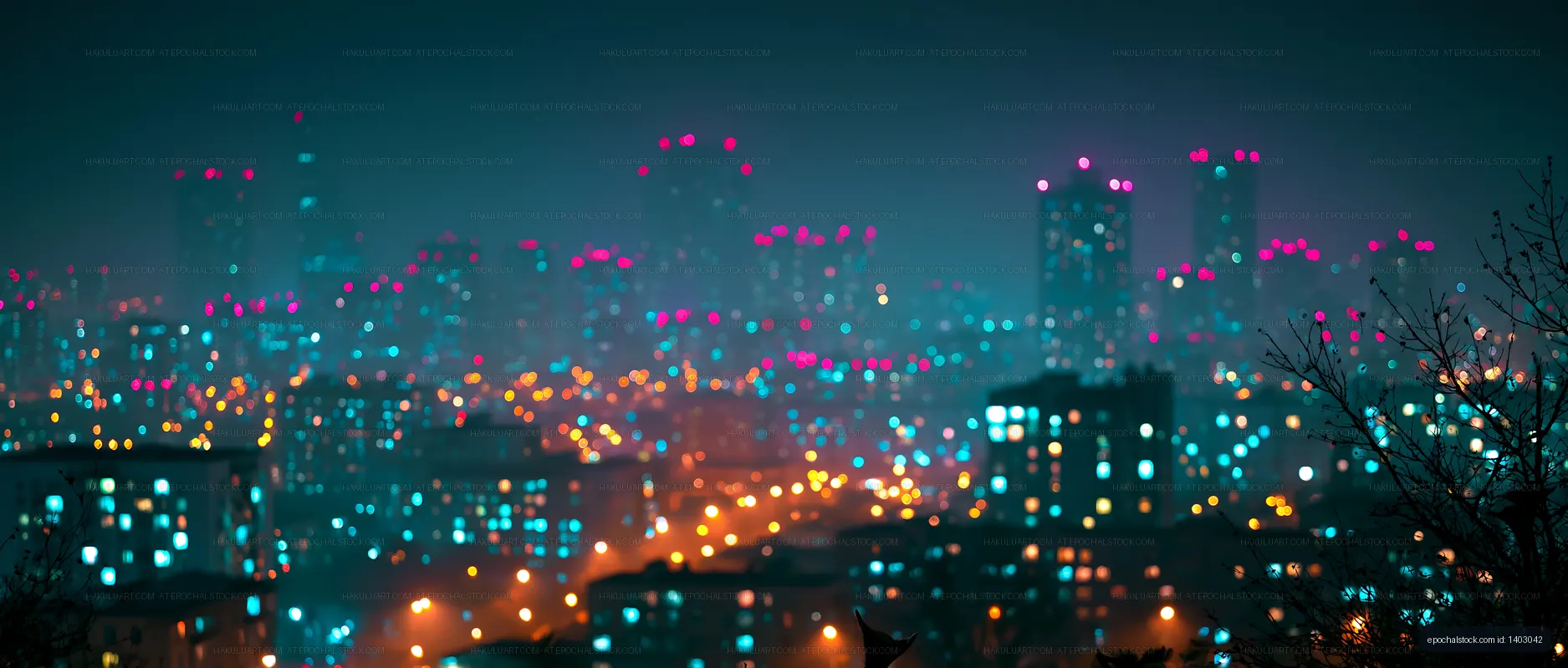 City skyline at night with colorful lights and fog