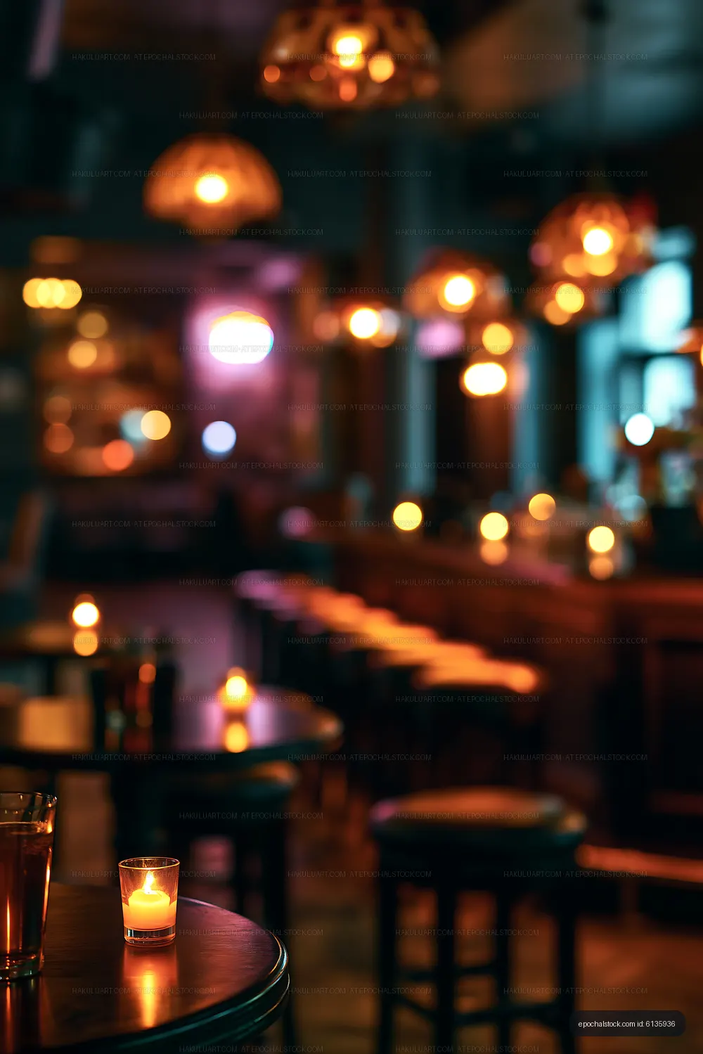 Cozy bar setting with candles and dim lighting