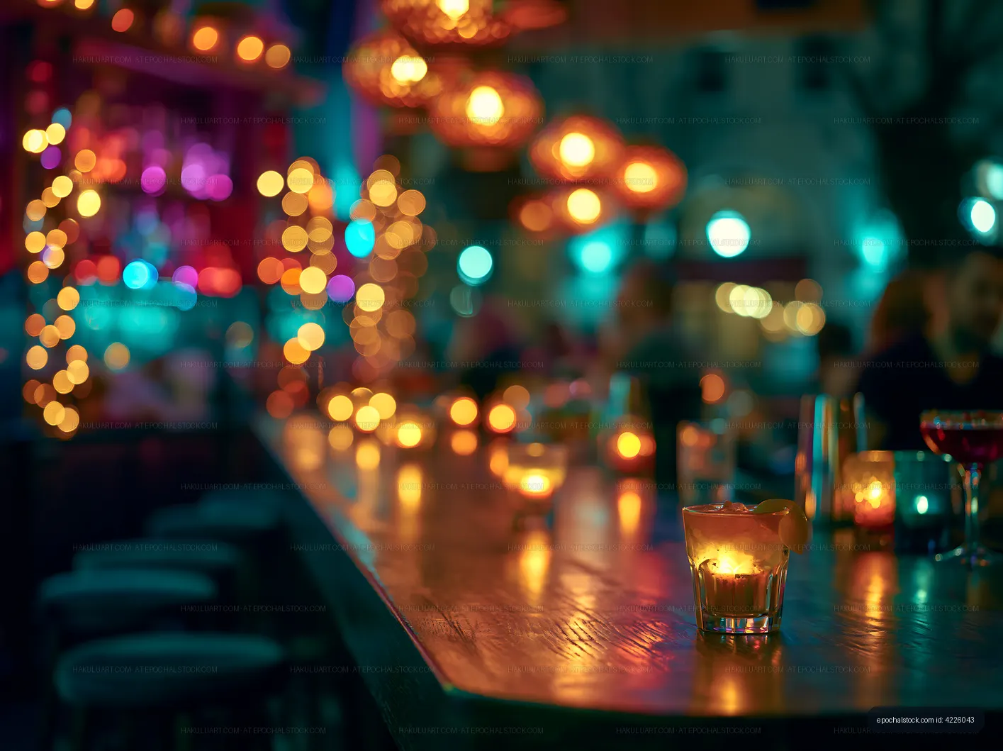 Cozy bar scene with drinks and warm lighting at night