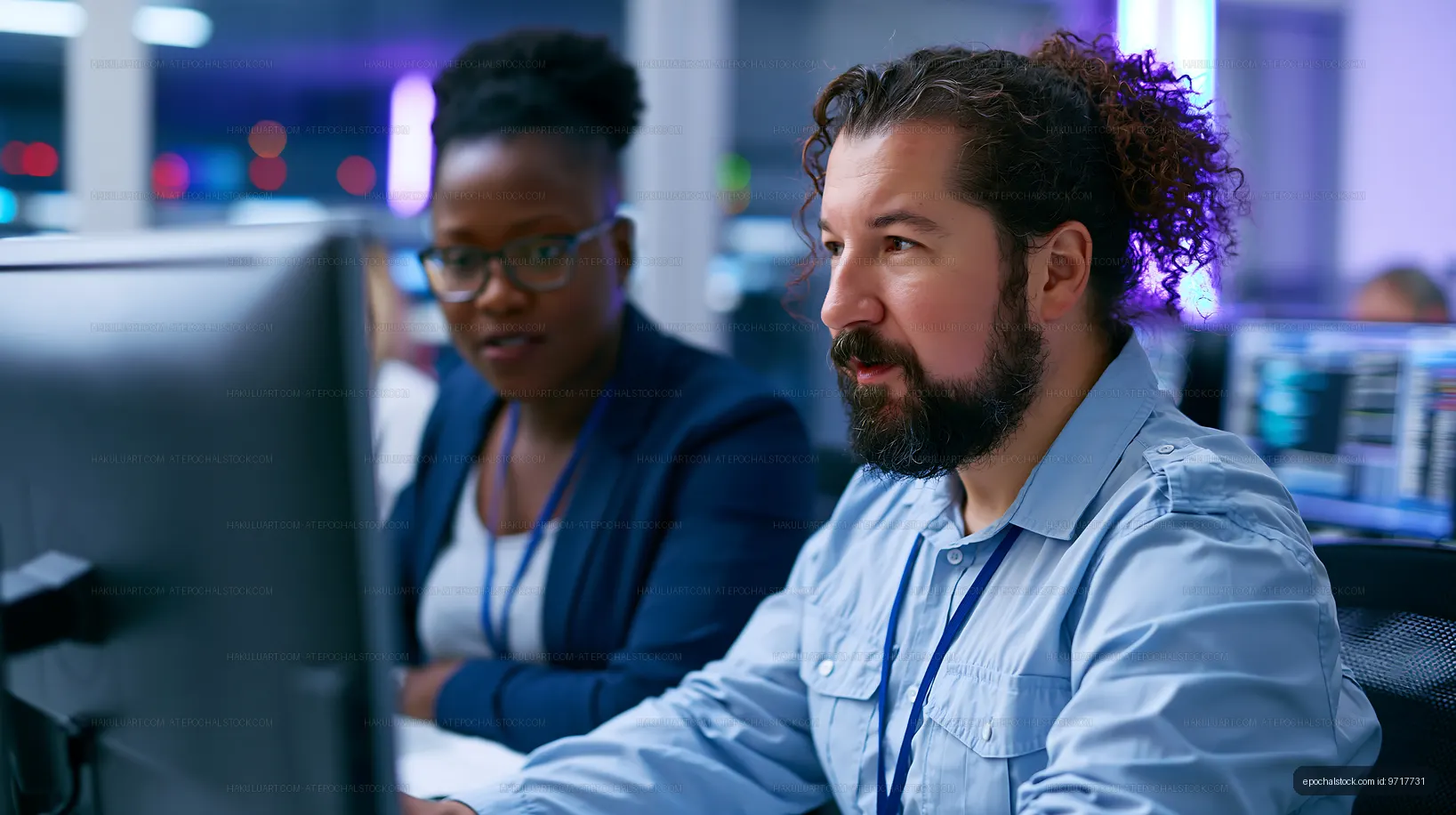 Team members discussing data in a modern office environment