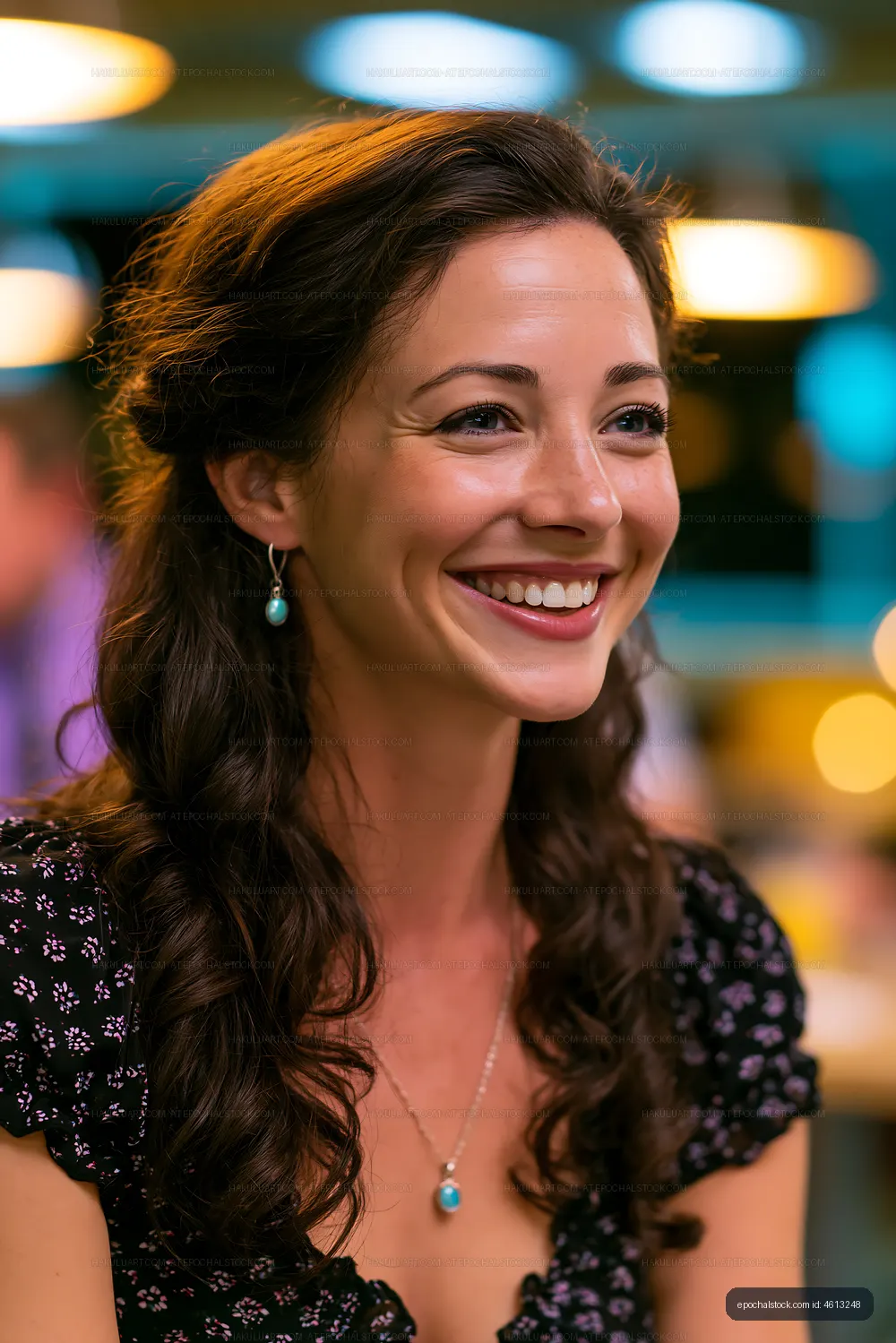 Smiling woman at a social gathering in a modern setting