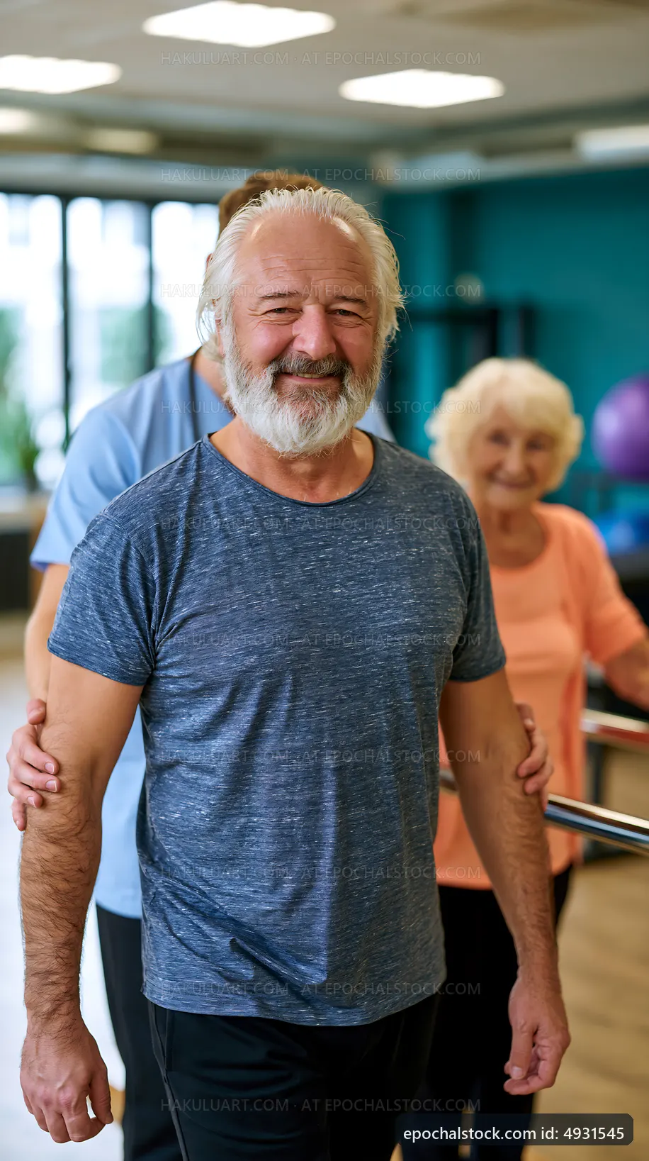 Senior man smiling in rehabilitation center during physical therapy