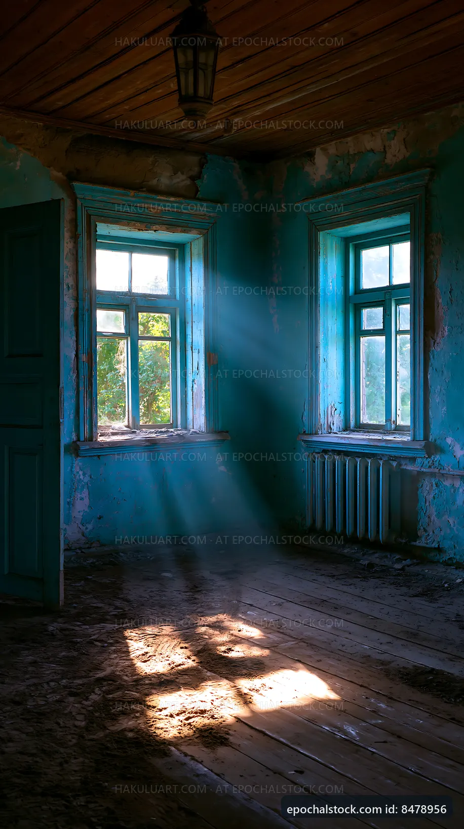 Light beams in an empty room with blue walls and wooden floor