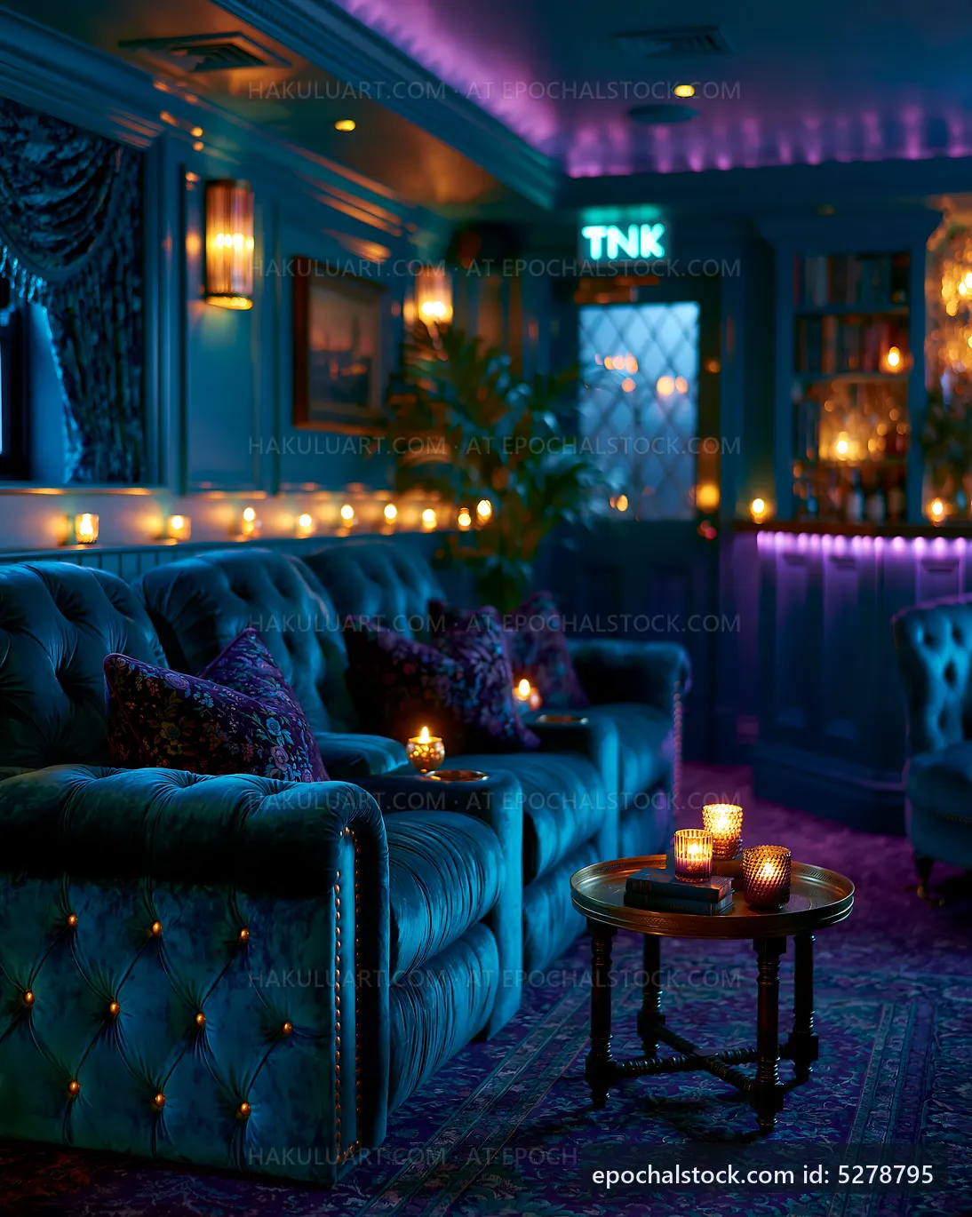 Cozy lounge area with candles and blue lighting in the evening