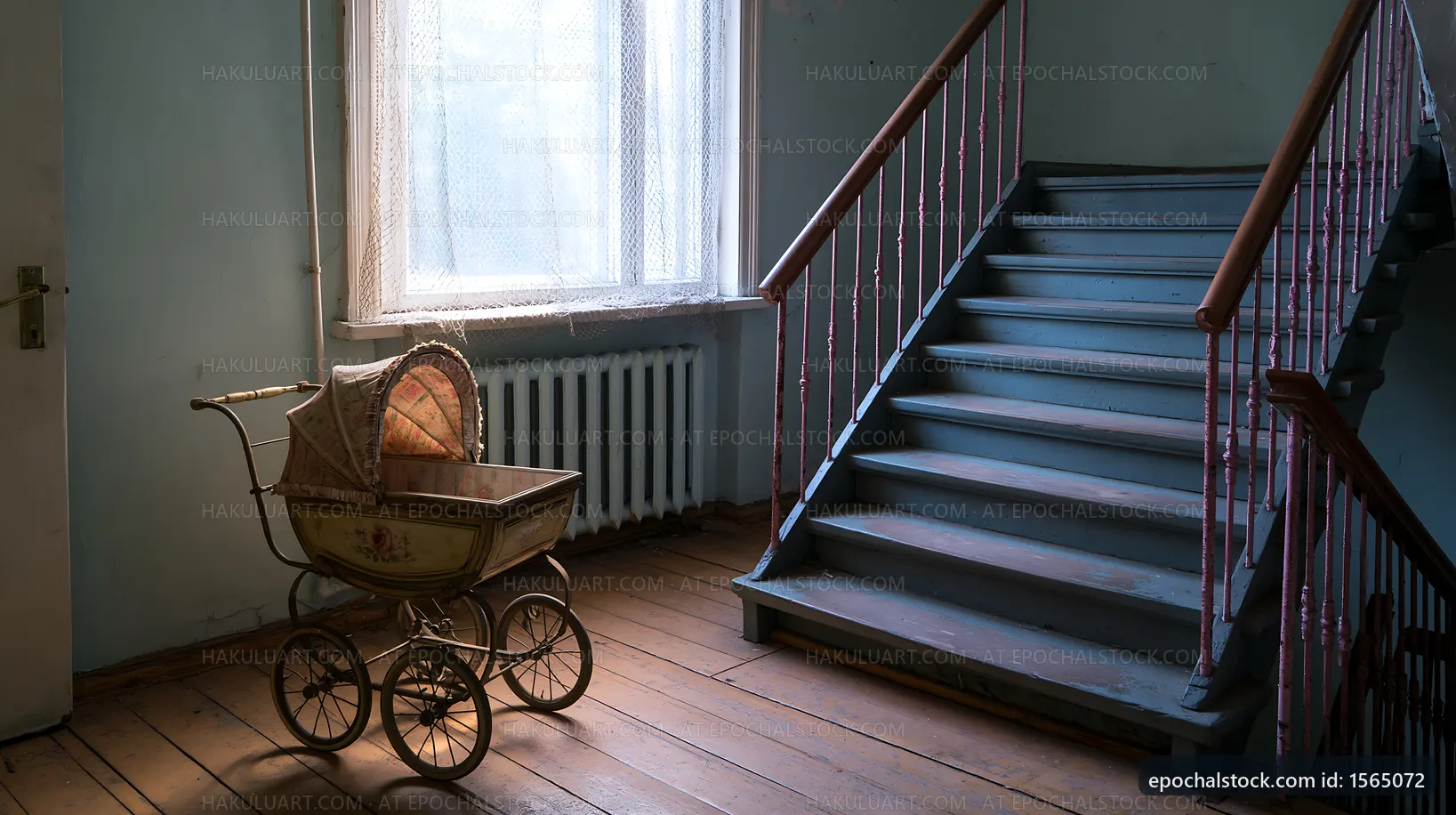 Old baby carriage in an empty stairwell by a window
