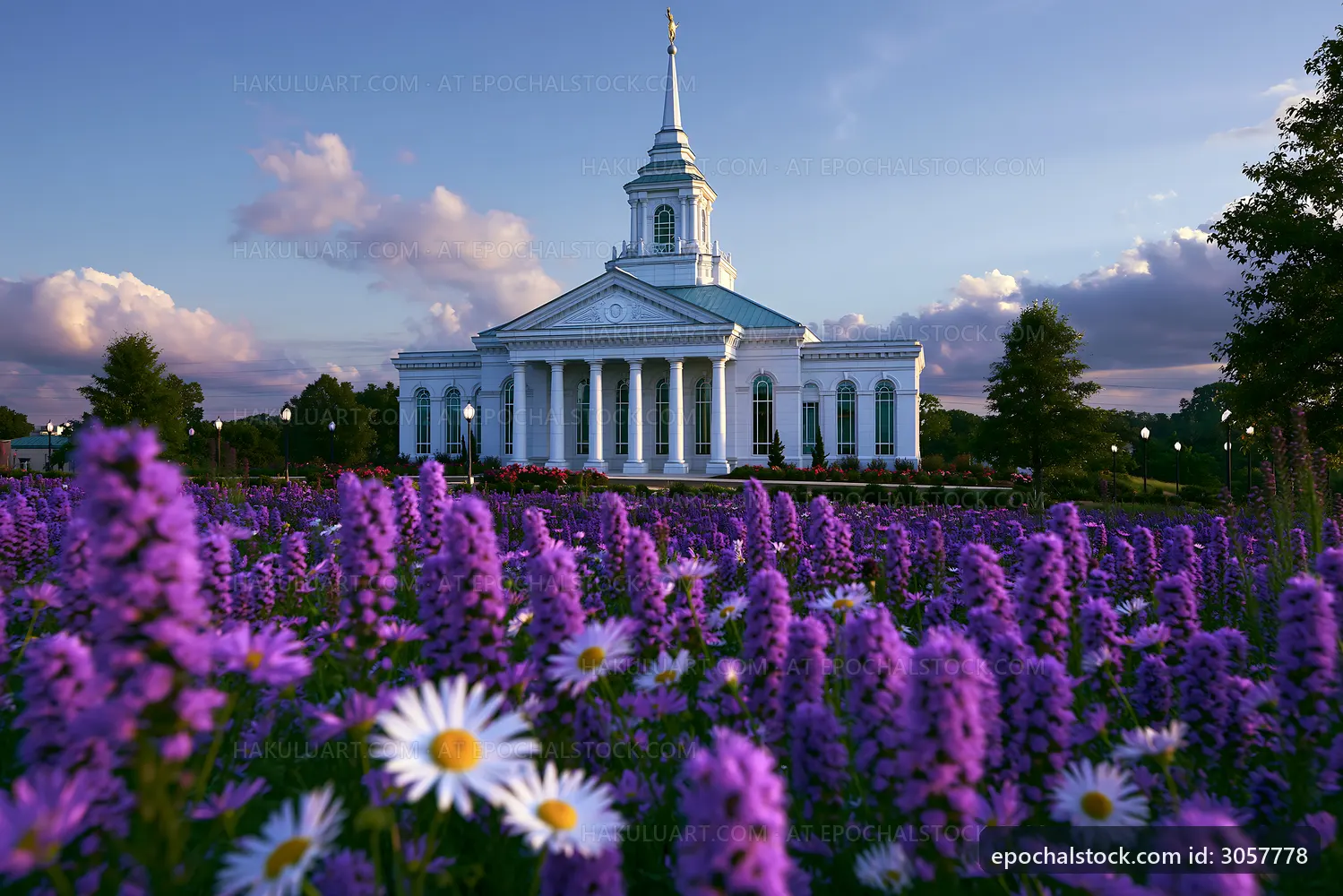 Church building surrounded by flowers in a garden setting