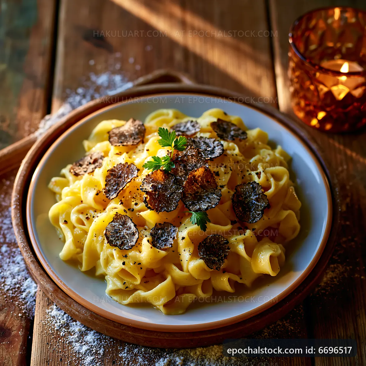 Delicious pasta dish served on wooden table with truffle slices