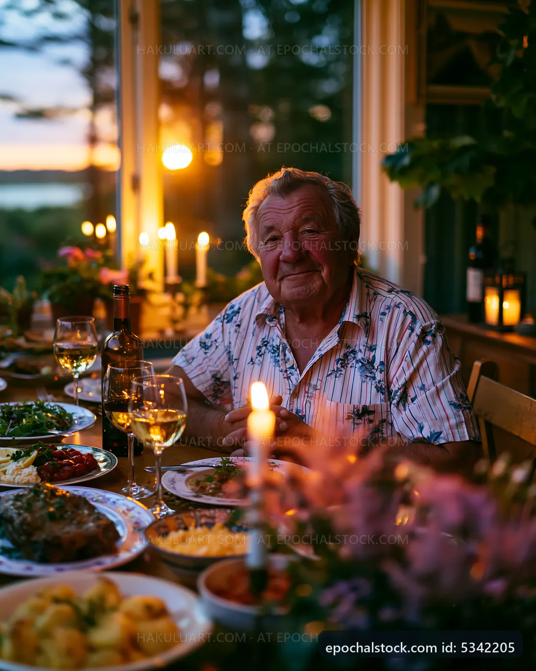 Gathering at dinner with candles and sunset view