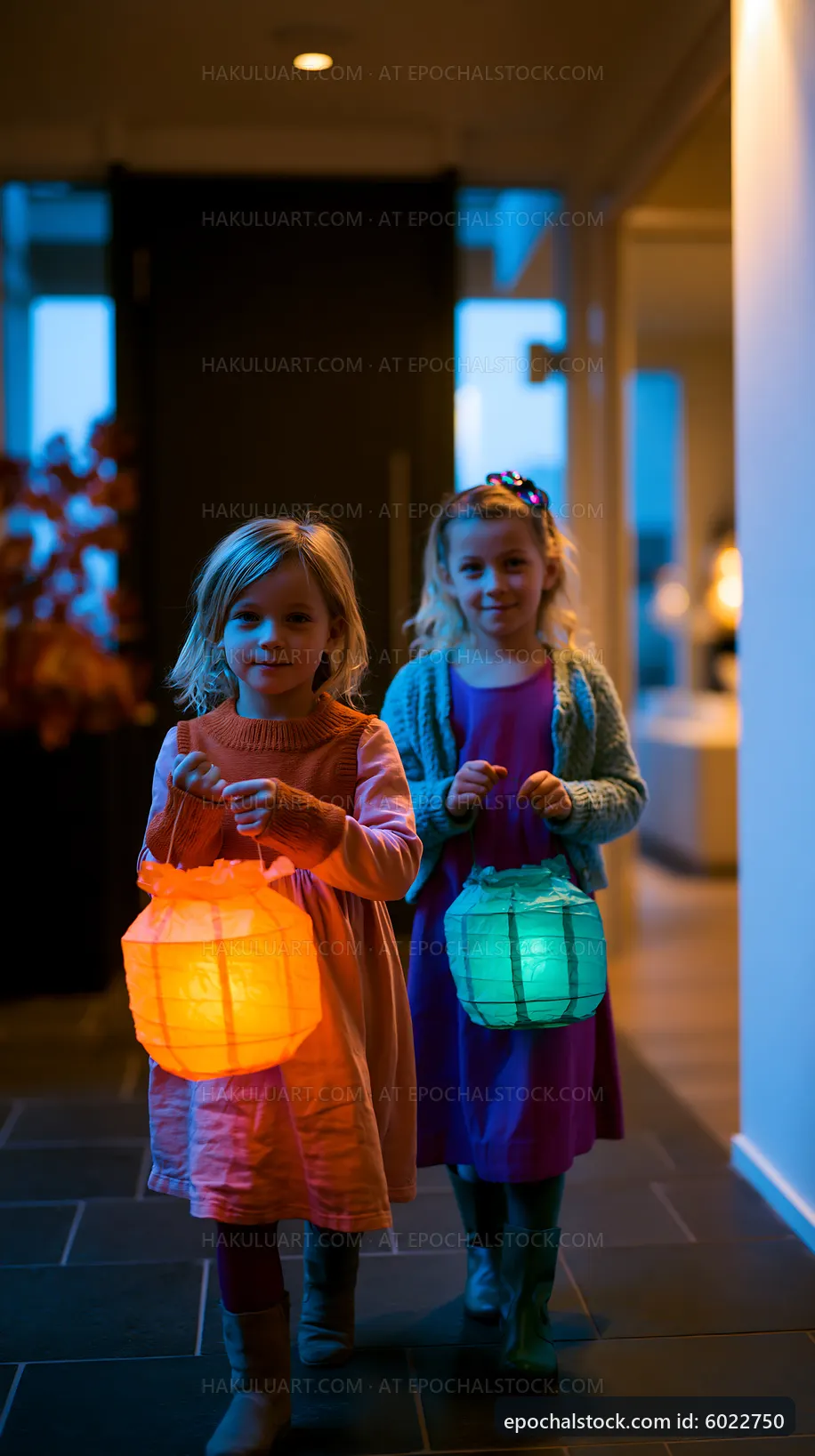 Children walking indoors with lanterns during evening
