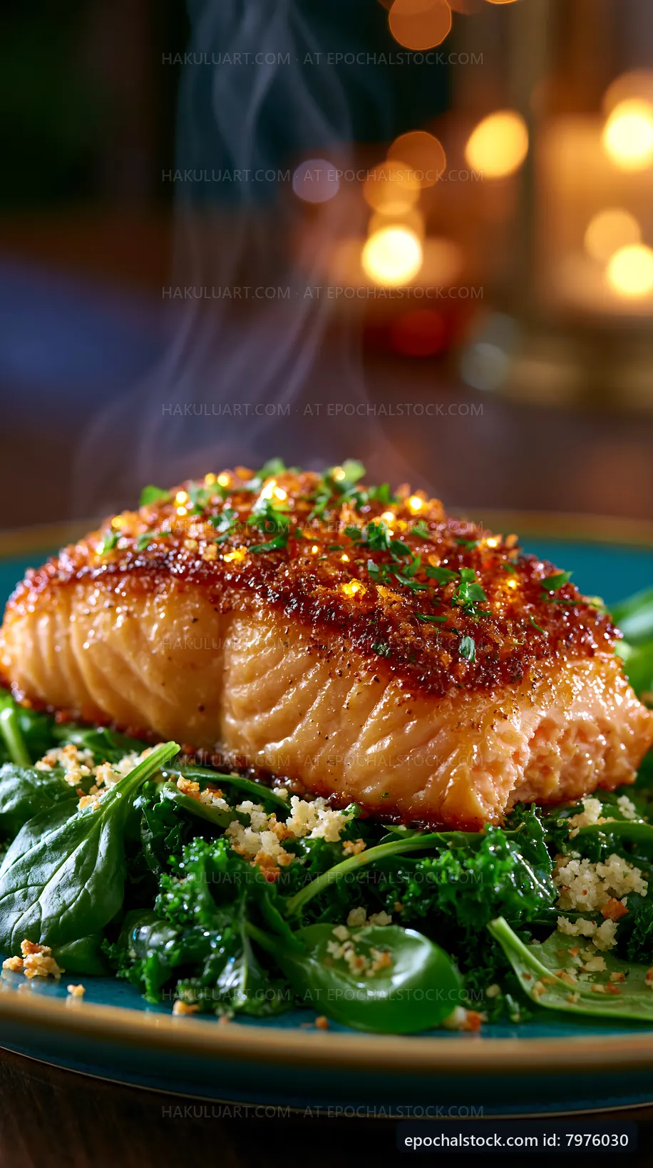Grilled salmon fillet on bed of greens with herbs and spices
