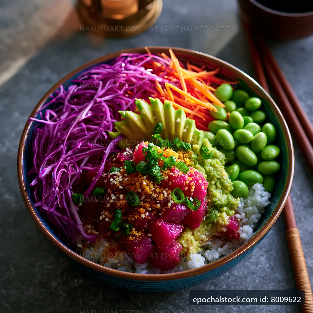 Colorful poke bowl with fresh vegetables and fish on a stone surface