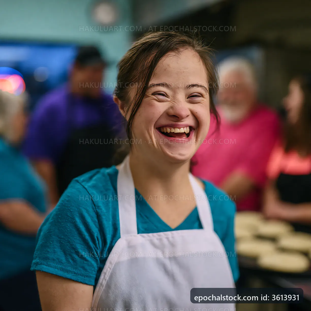 Smiling young woman in apron helping in a community kitchen