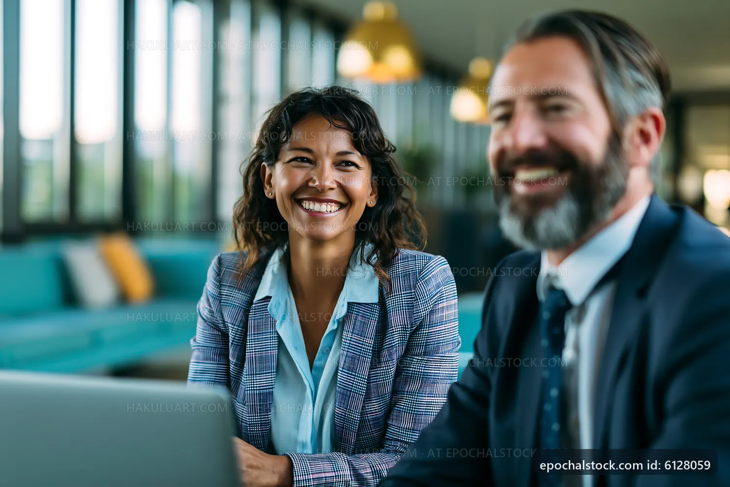 Smiling colleagues working together in a modern office