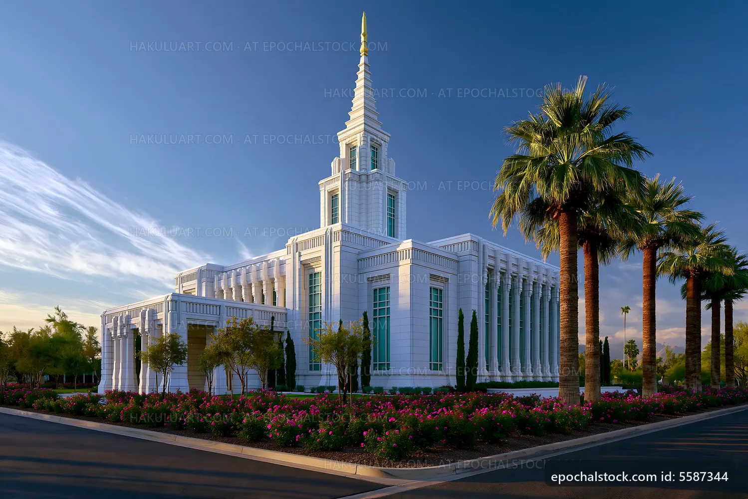 White temple building with palm trees and flowers at sunset