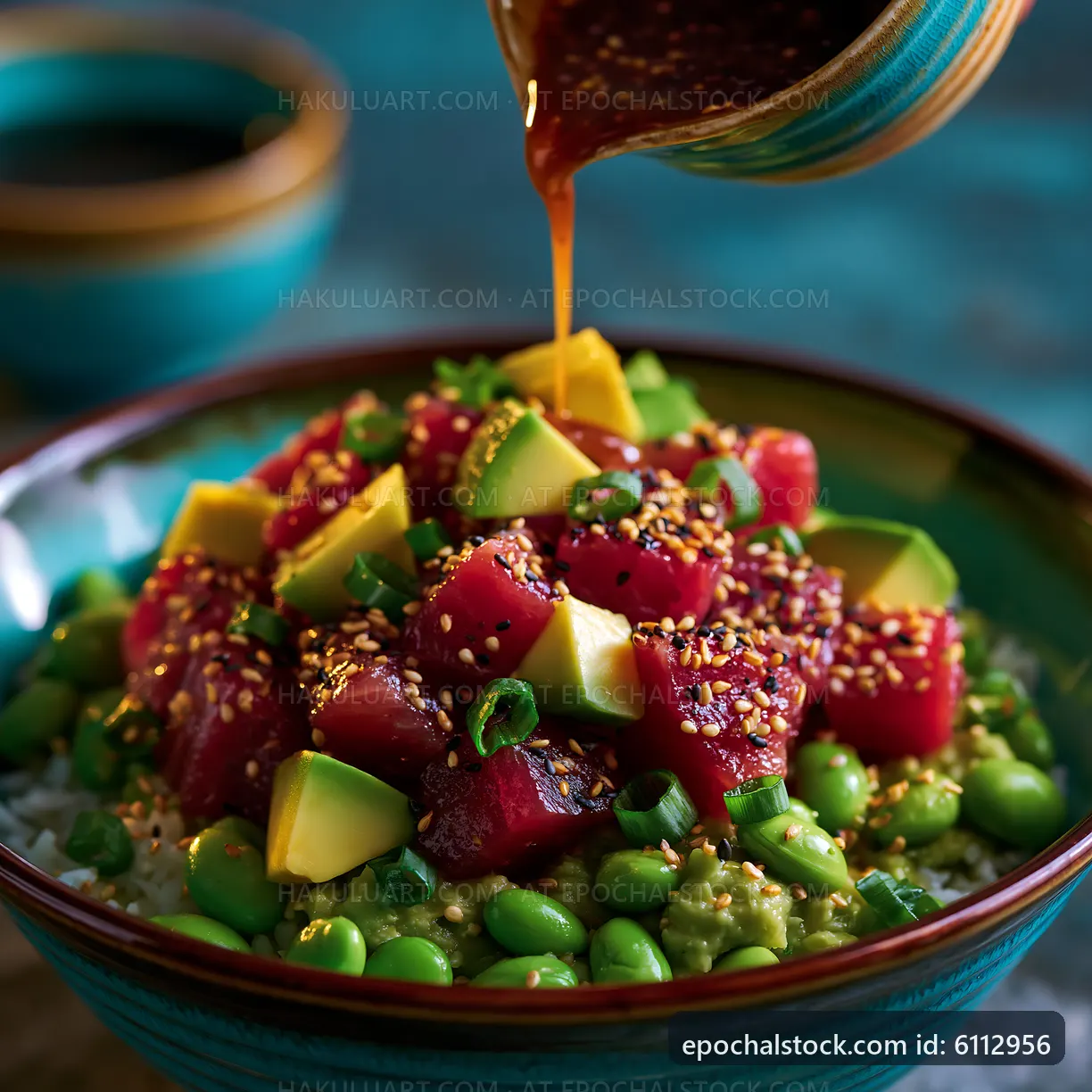 Fresh poke bowl with tuna, avocado, and sesame seeds