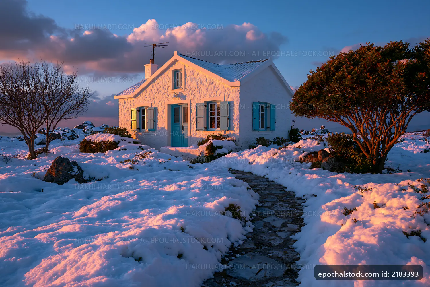 Snow-covered house with blue shutters at sunset