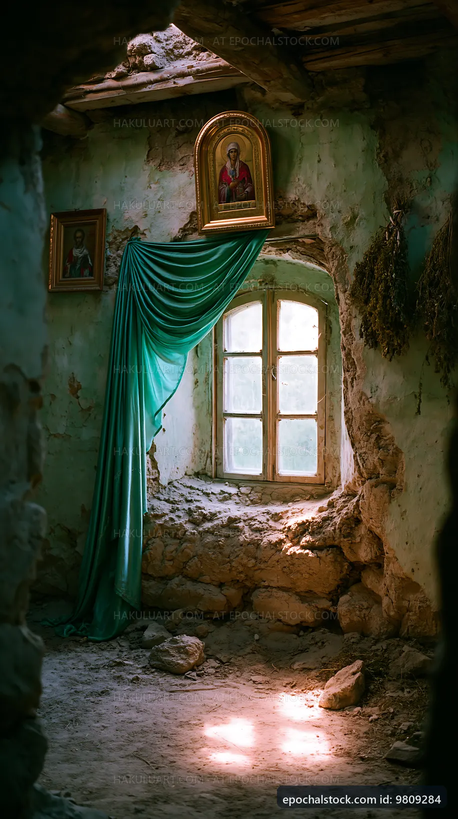 Old room with window and religious icons in abandoned building