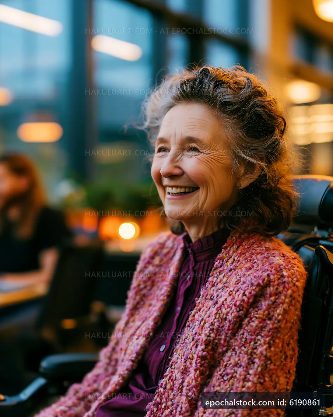 Smiling elderly woman in wheelchair at a cozy cafe setting