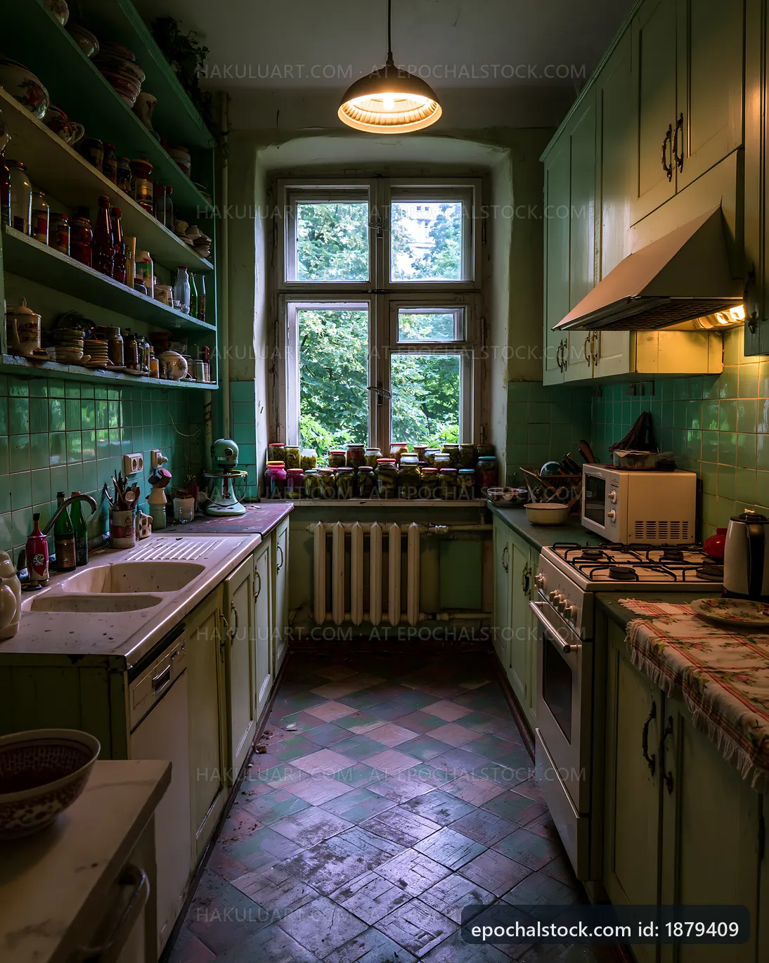 Vintage kitchen with green cabinets and a sunny window