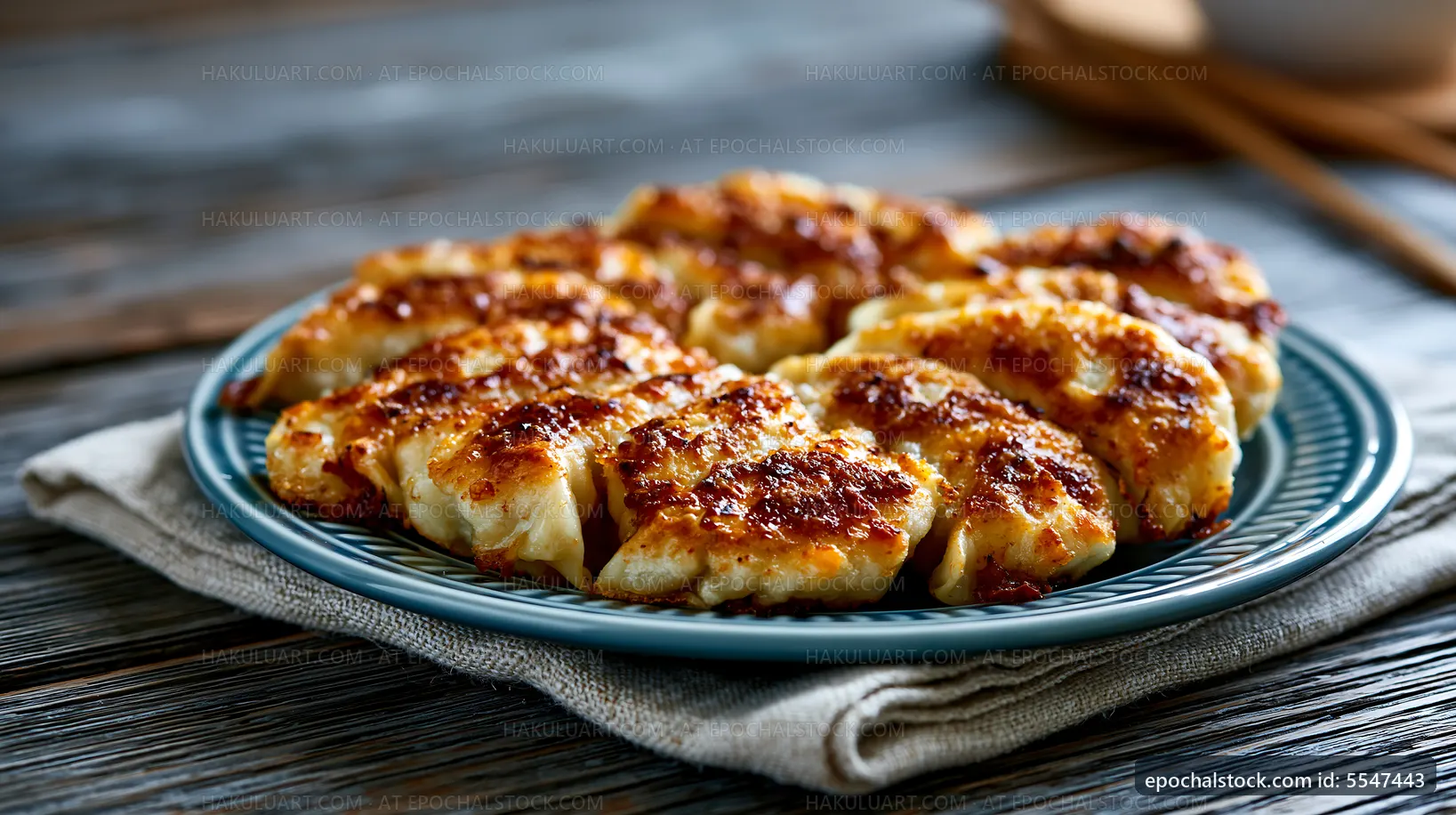Delicious grilled dumplings served on a blue plate