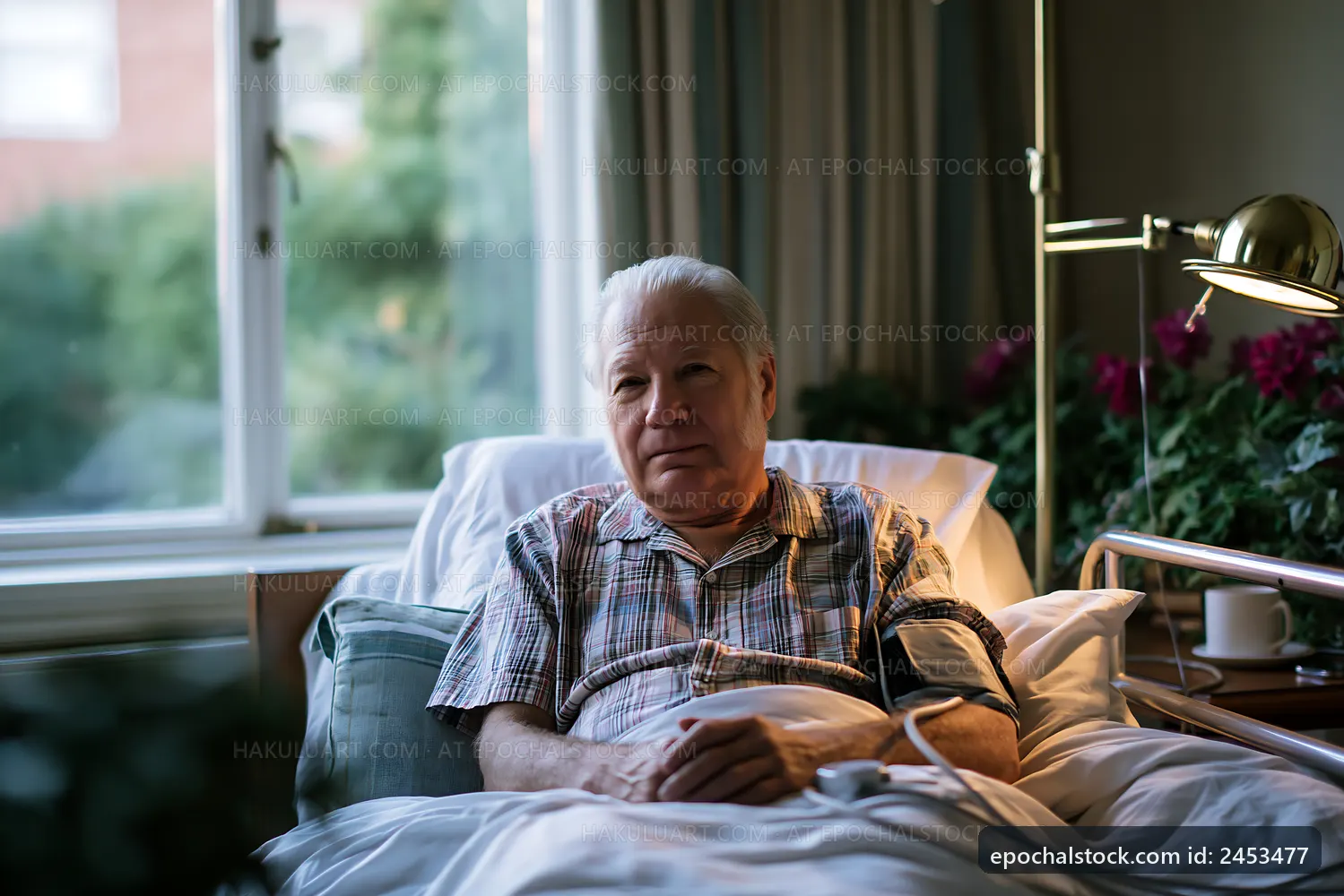 Elderly man sitting on a hospital bed with a blood pressure monitor
