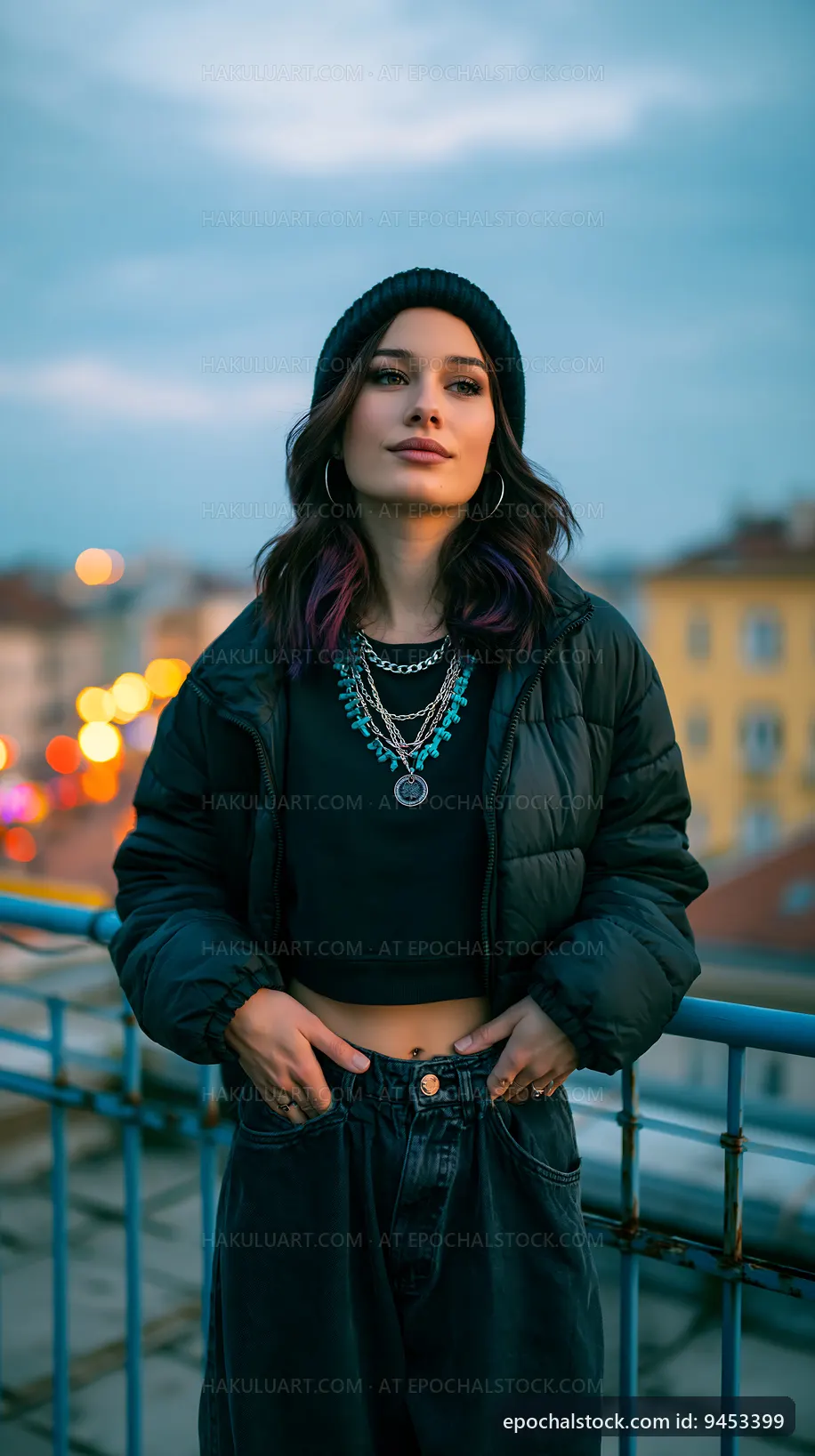 Woman with casual style poses on balcony in evening light