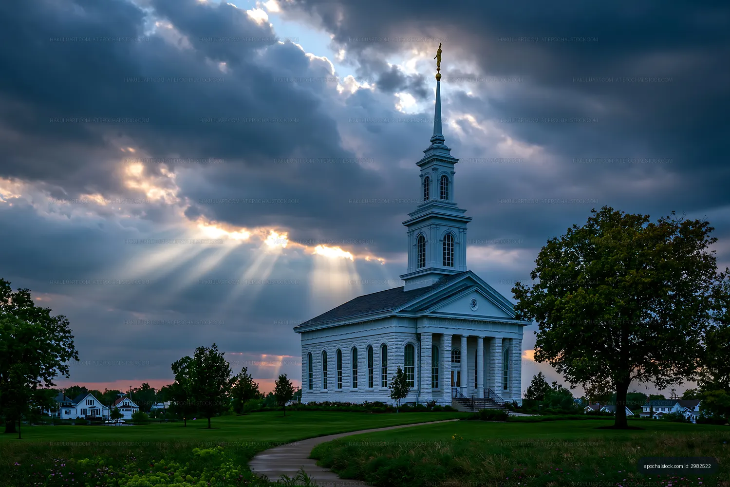 Church under cloudy sky with sunlight rays shining through