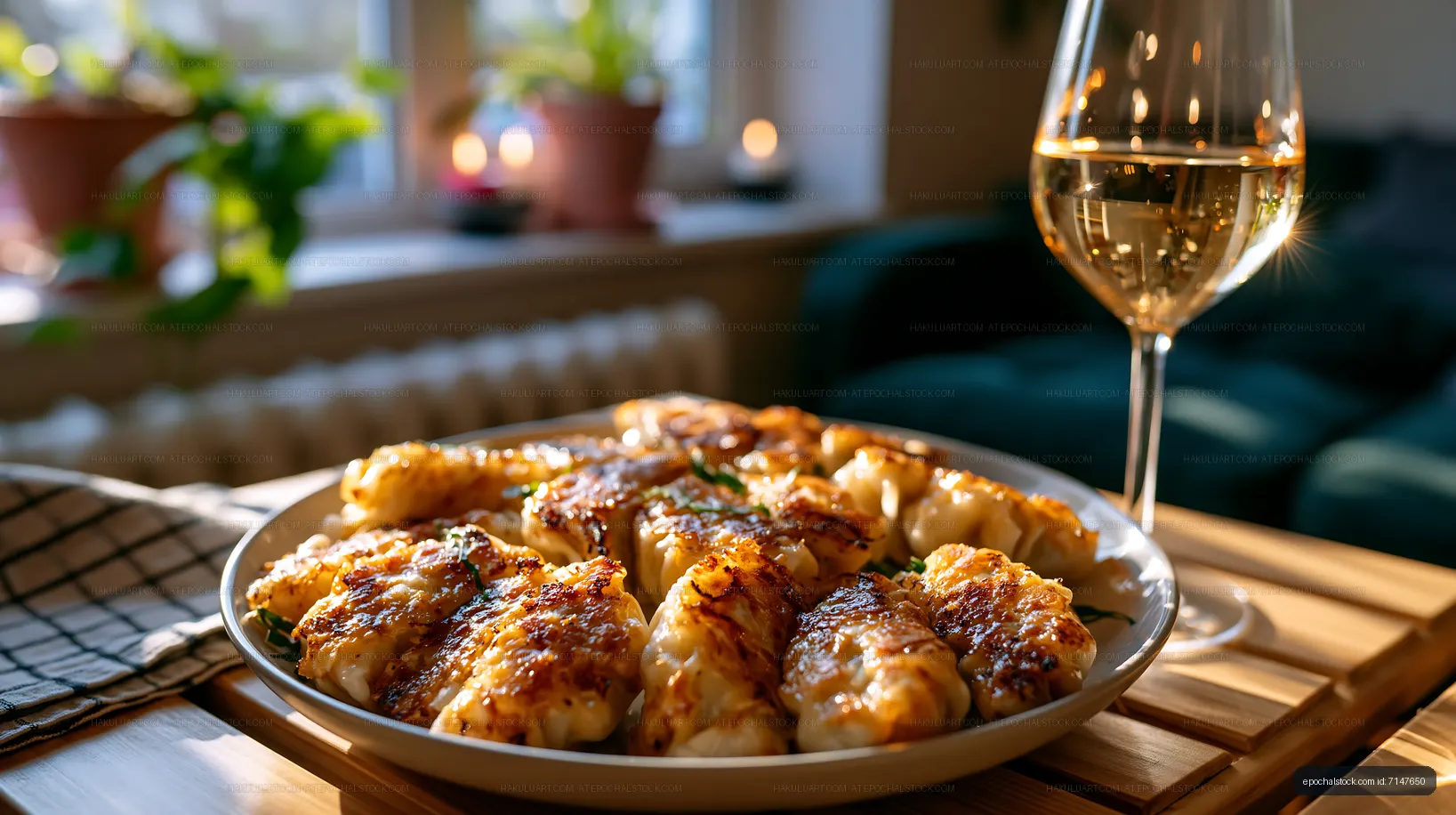 Dishes of grilled seafood with a glass of white wine at home