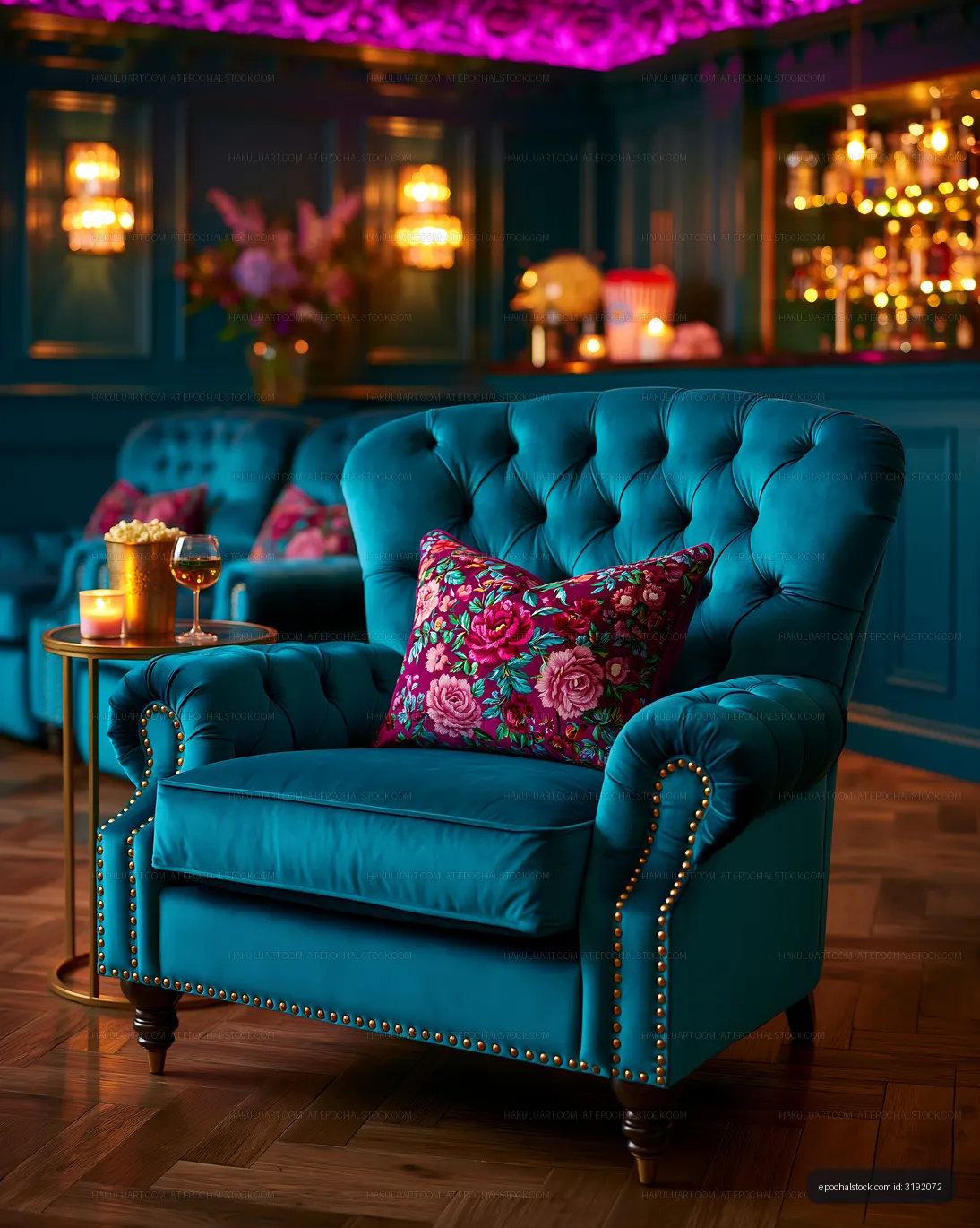 Cozy turquoise armchair with floral cushion in stylish lounge