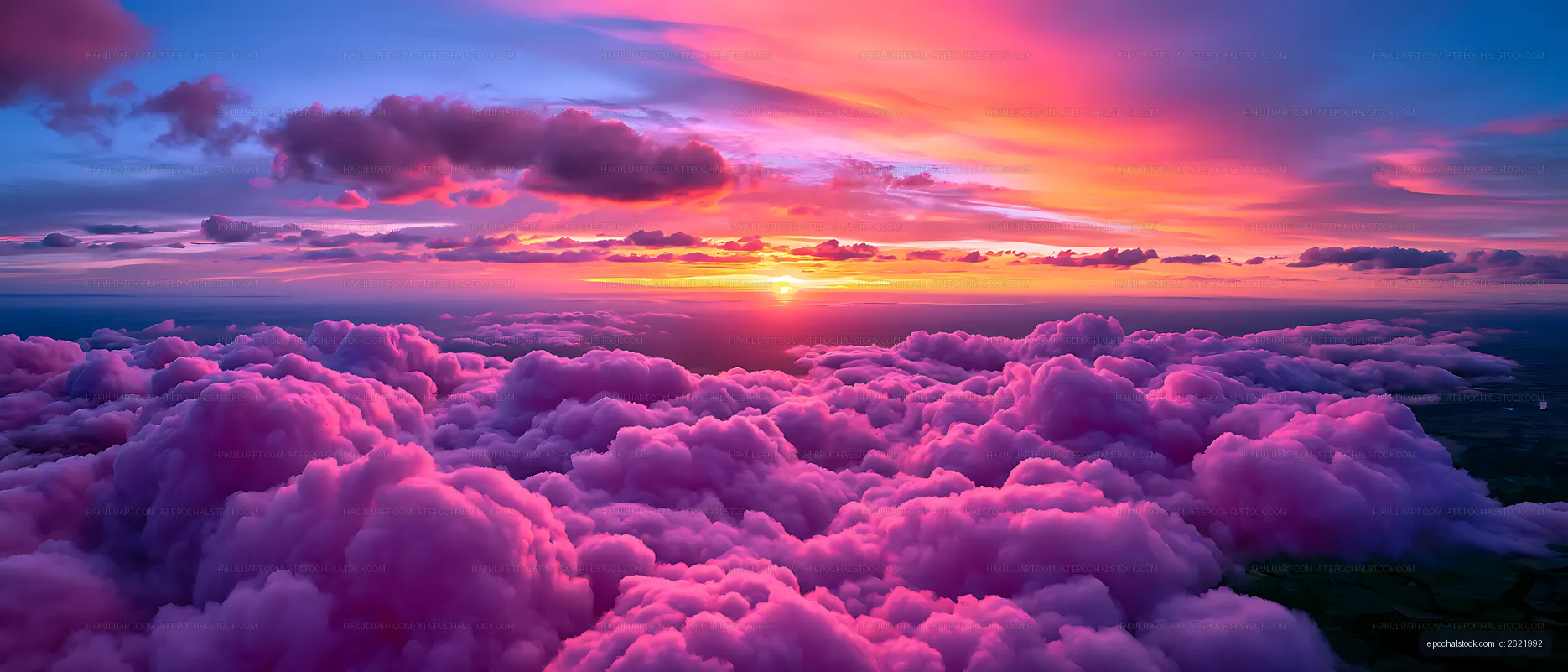 Bright sunset over purple clouds in the sky