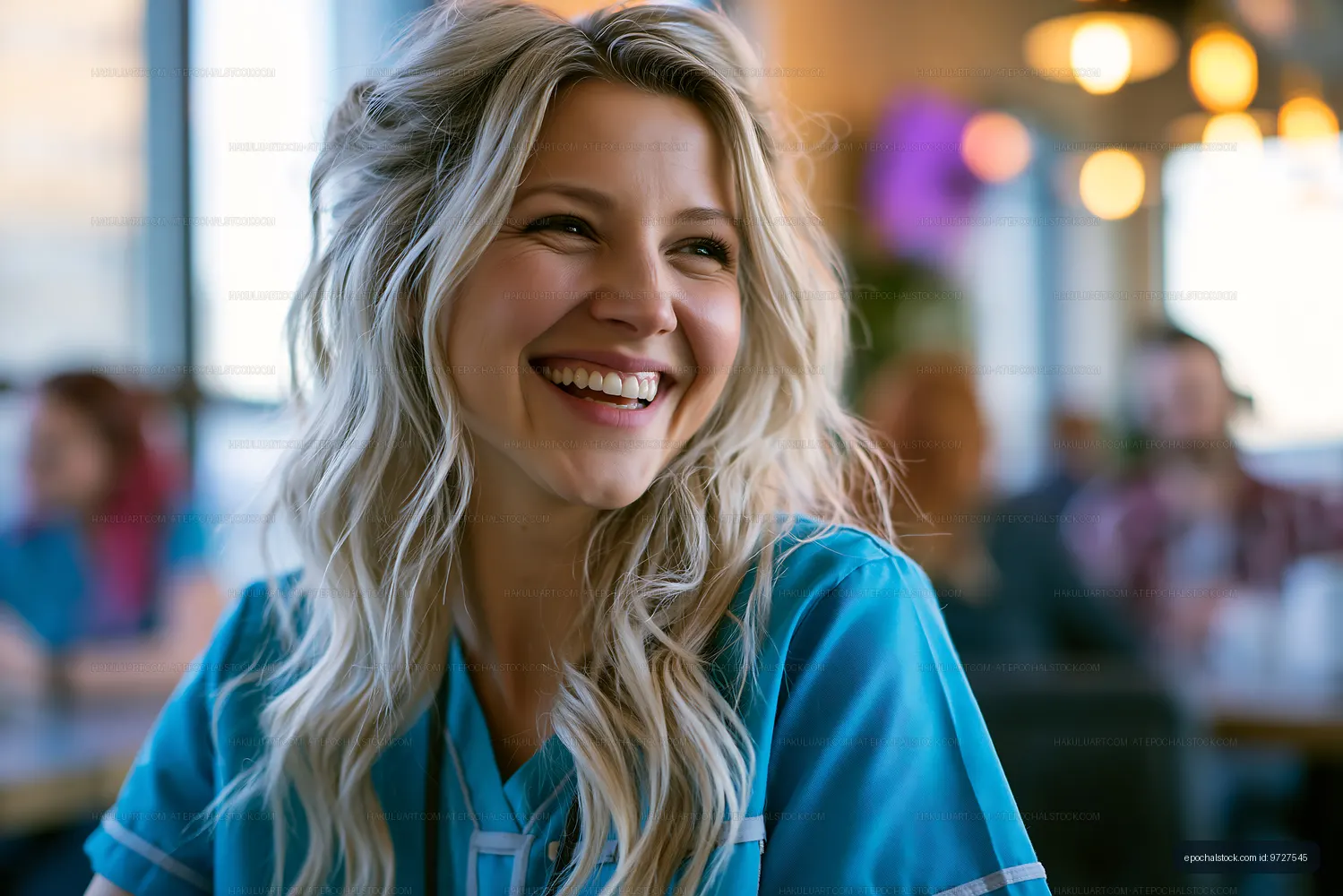 Smiling woman in blue uniform at a busy cafe