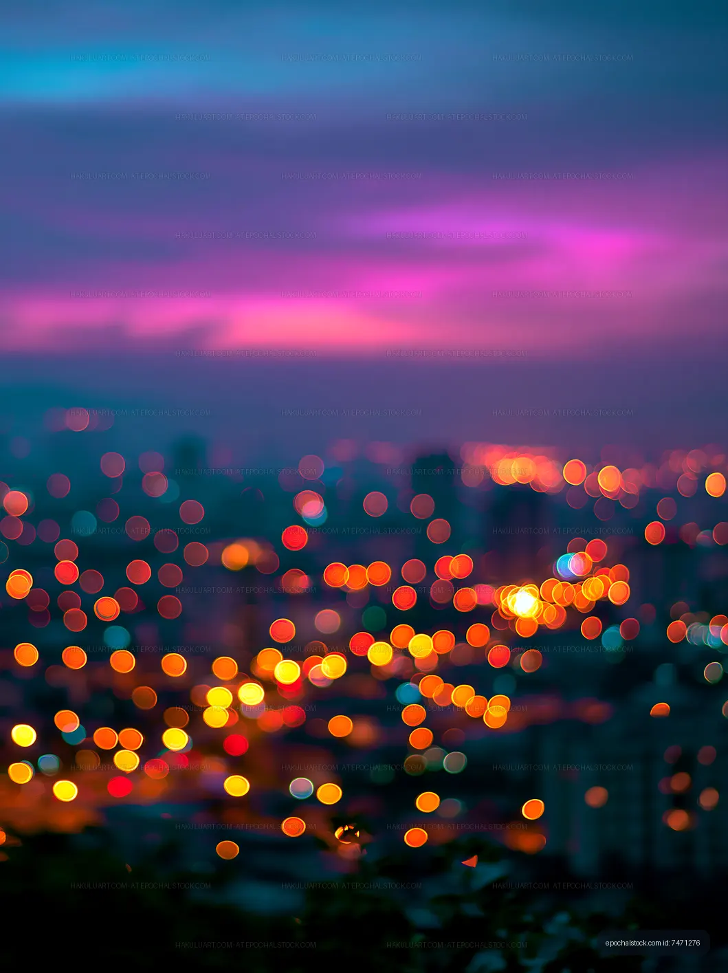 City skyline at night with blurred colorful lights