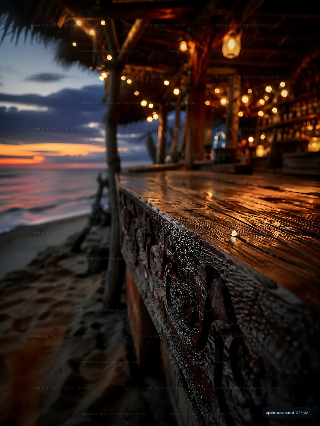 Wooden bar at beachside restaurant during sunset