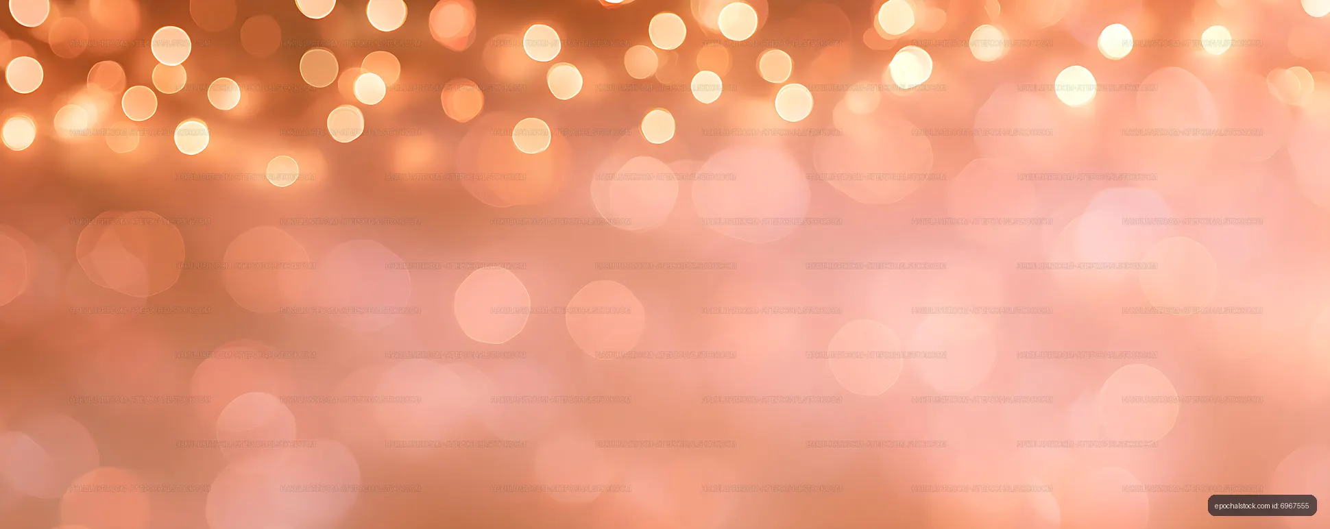 Soft bokeh lights on a warm background for festive themes