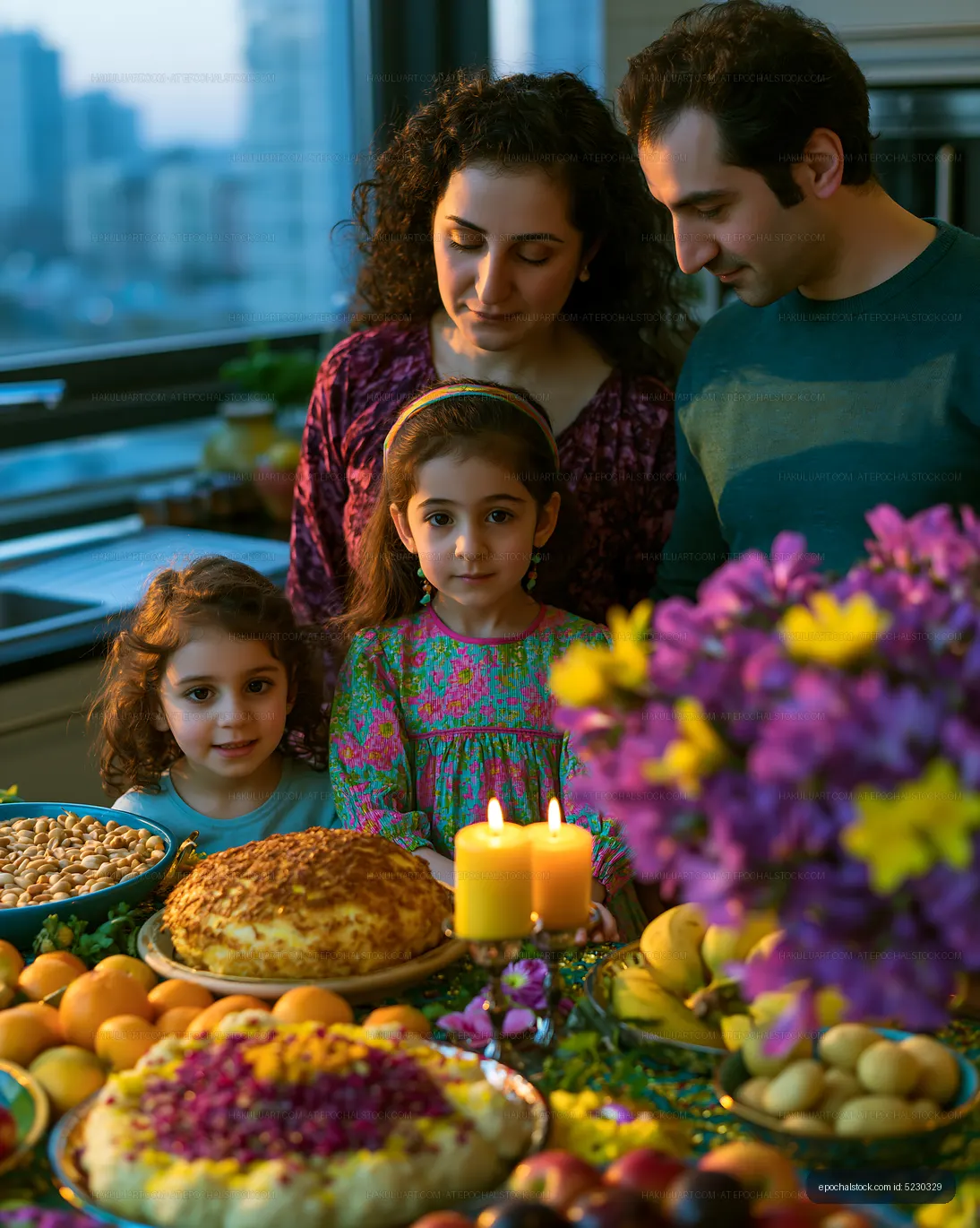 Family gathering at a table with festive food and decorations