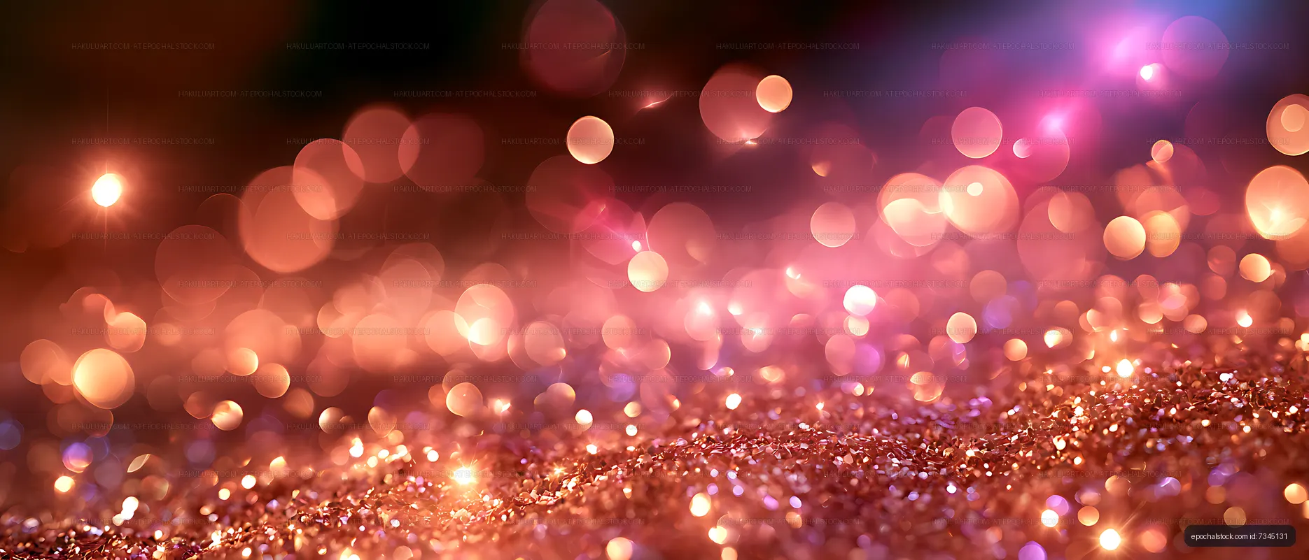 Warm colorful bokeh glow above a glittering abstract surface