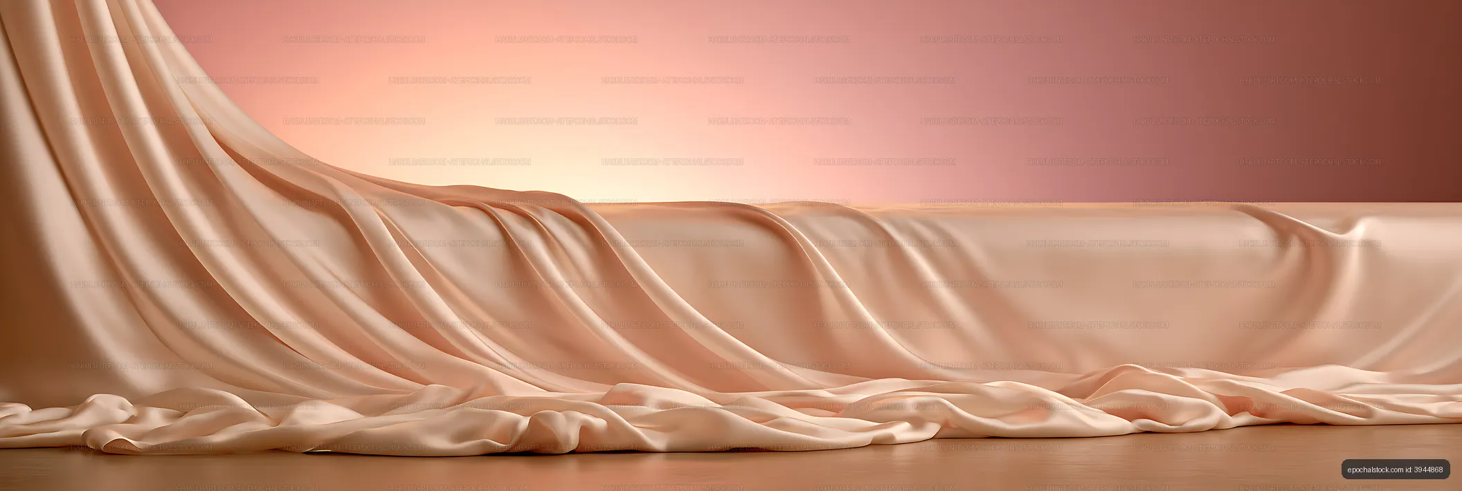 Peach satin drapery on a warm pink backdrop
