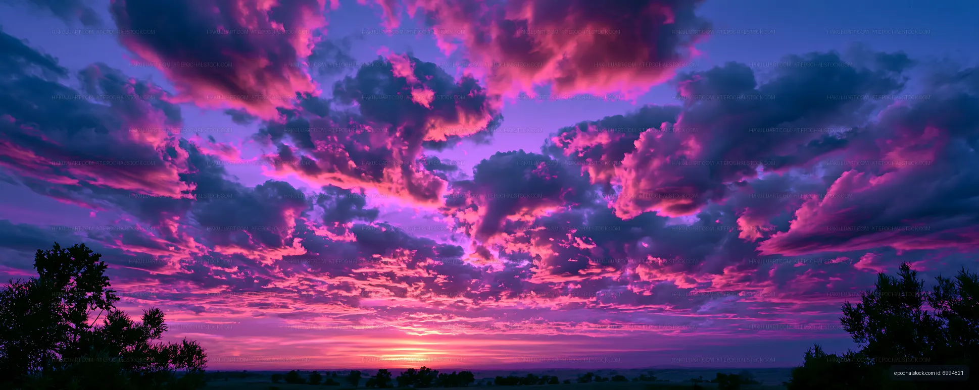 Panoramic purple and pink sunset over the countryside