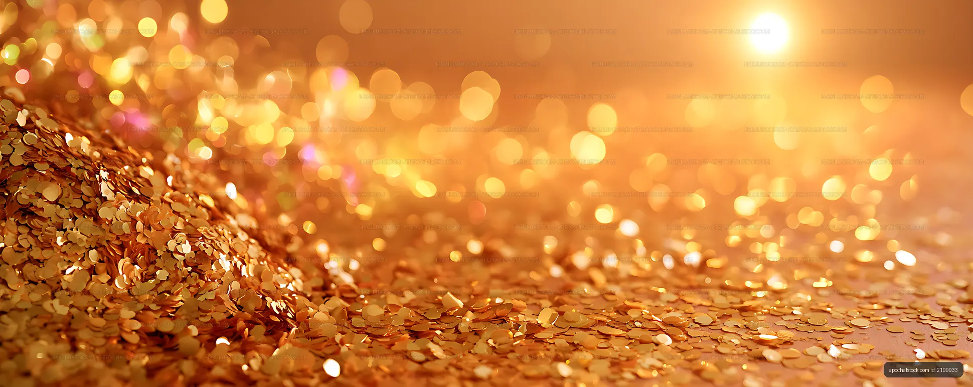 Warm golden confetti with sparkling bokeh and copy space