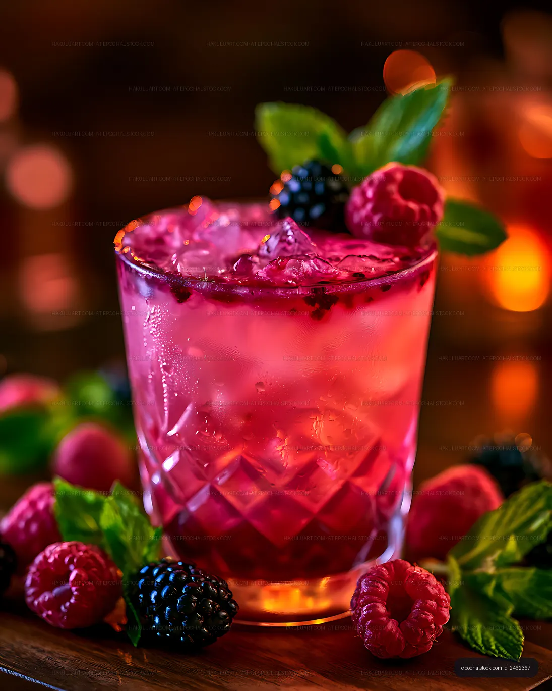 Colorful iced berry beverage in a decorative glass