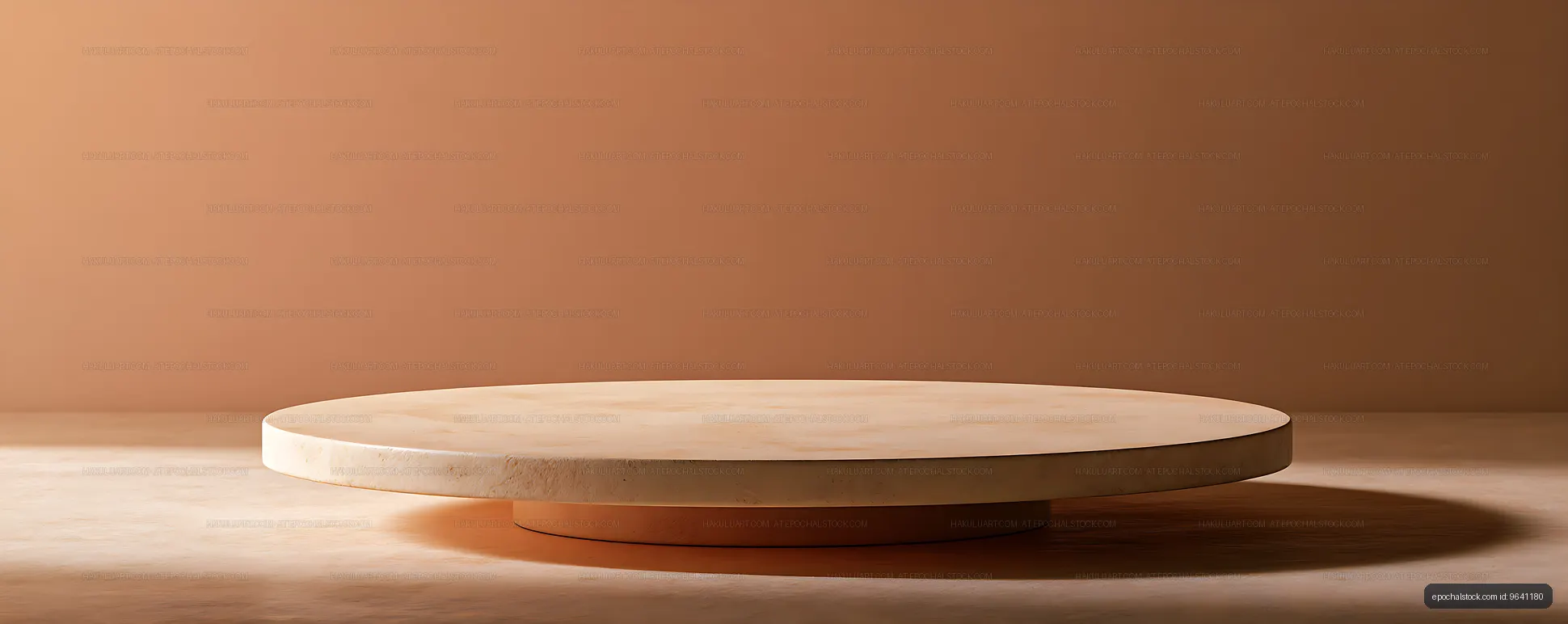 Cream round pedestal on a warm brown background
