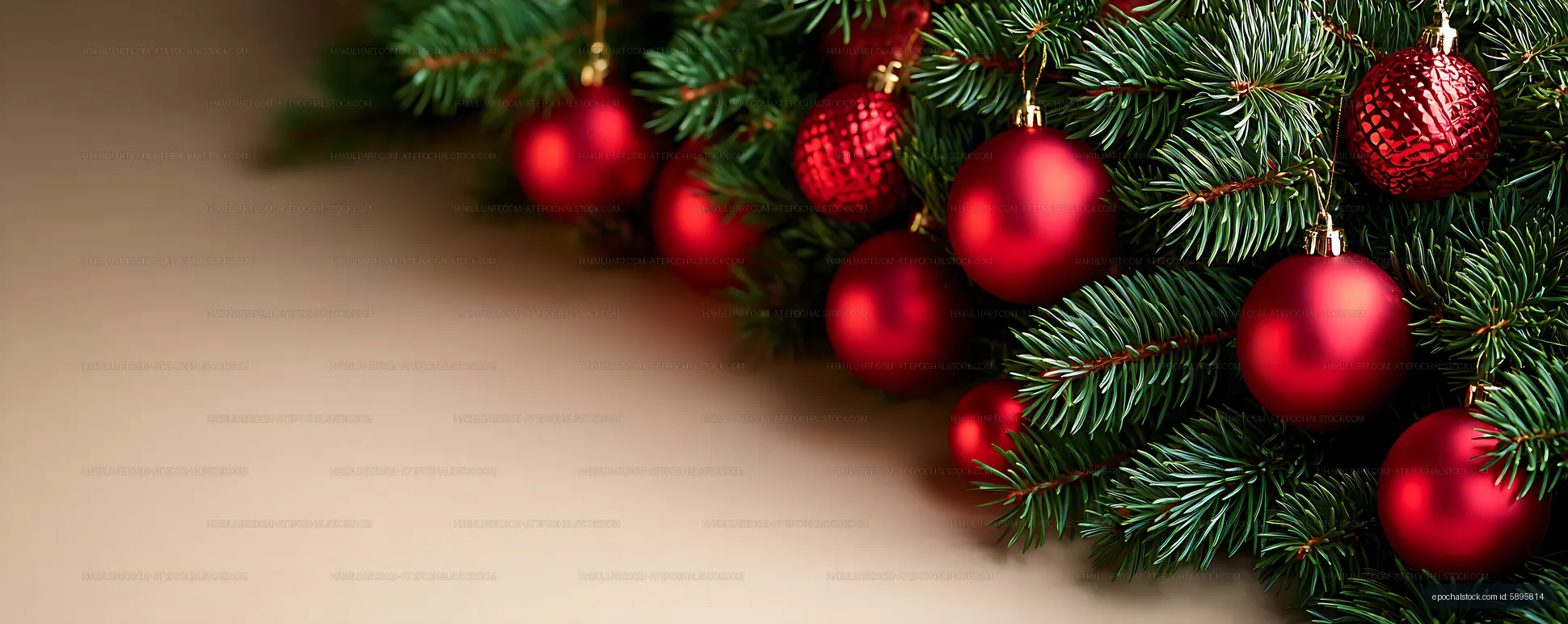Festive red ornaments and evergreen Christmas branches