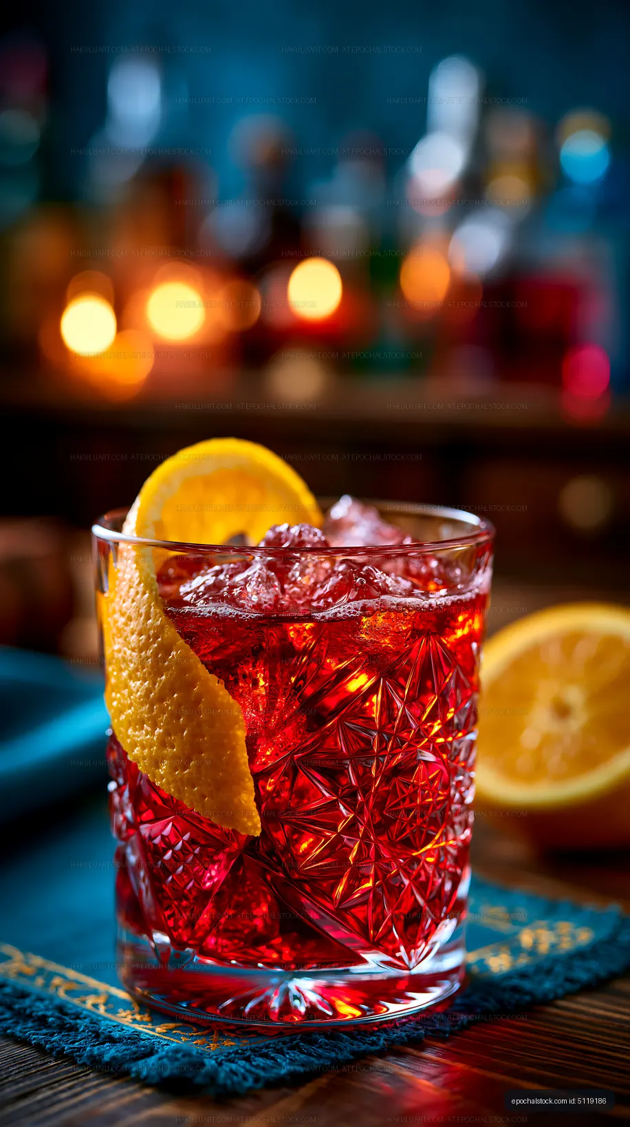 Citrus cocktail with ice and orange peel